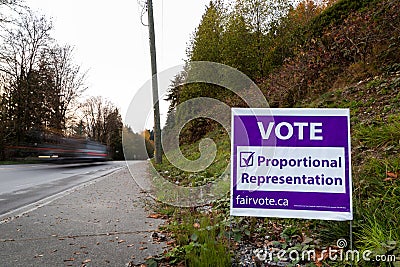 NORTH VANCOUVER, BC, CANADA - NOV 08, 2018: Signage on Dollarton Highway reminding citizen to vote in BC`s electoral Editorial Stock Photo