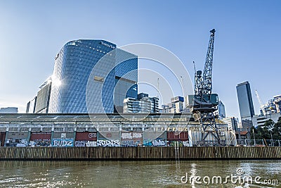 North Wharf Cargo Shed and Crane viewed from a tourist sightseeing boat Editorial Stock Photo