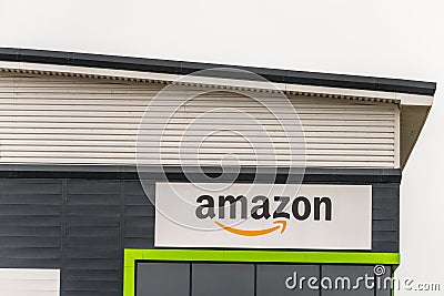 Northampton UK January 23 2018: Amazon Logistics Marketplace logo sign on warehouse wall in Grange Park Industrial Editorial Stock Photo