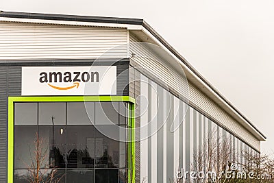 Northampton UK January 23 2018: Amazon Logistics Marketplace logo sign on warehouse wall in Grange Park Industrial Editorial Stock Photo