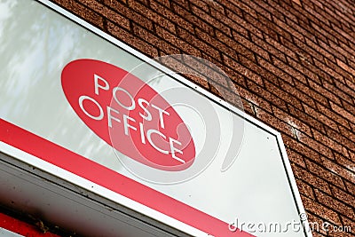 Northampton UK October 3, 2017: Post Office logo sign stand Northampton Editorial Stock Photo