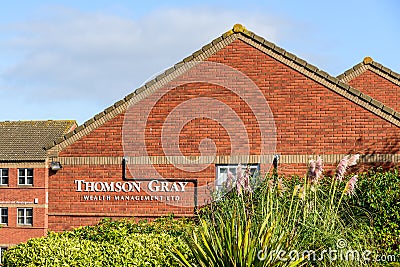 Northampton UK October 3, 2017: Thompson Gray Wealth Management logo sign stand Northampton industrial estate Editorial Stock Photo