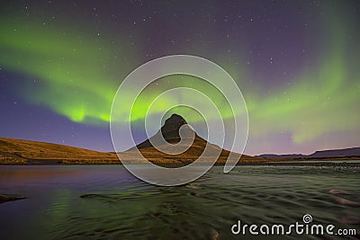 Northern Light over Kirkjufell, Grundarfjordur town Stock Photo