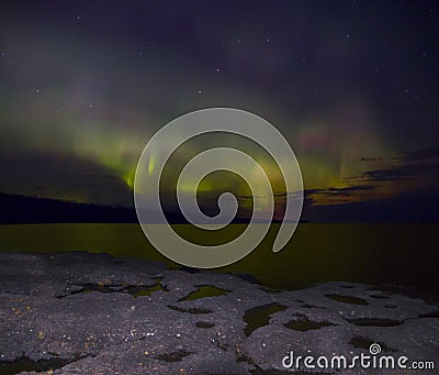 Northern Lights dance above the North Shore of Lake Superior in Minnesota Stock Photo