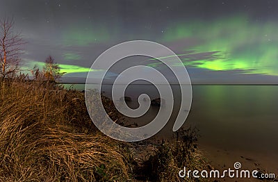 Northern lights on lake Ladoga Stock Photo