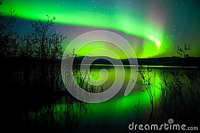 Northern lights mirrored on lake Stock Photo