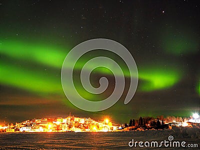 Northern Lights and Stars over City Stock Photo