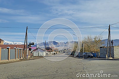 Northern Mongolia. The city of Ulgiy. Measured city life in the sunlight, local Mongolian people on the street moving about their Editorial Stock Photo