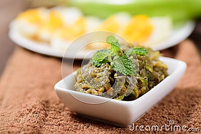 Northern Thai food,grilled green eggplant pounding with chili Stock Photo