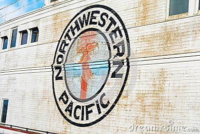 Northwestern Pacific Railroad sign on steam ferryboat Eureka preserved at Hyde Street Pier of San Francisco Maritime National Editorial Stock Photo