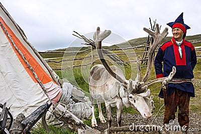 Norway: Deer and reindeer breeder dressed in national clothes Editorial Stock Photo