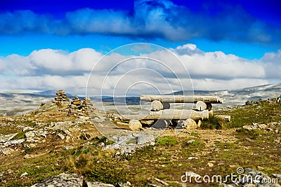 Norway viking camping table with zen stone tower landscape Stock Photo