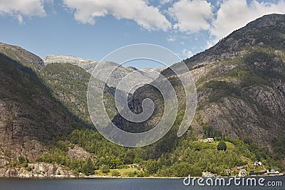 Norwegian fjord landscape with mountains and houses. Sorfjorden. Norway Stock Photo