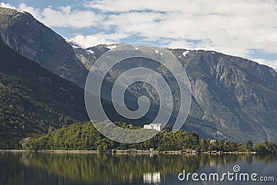 Norwegian fjord landscape with mountains and houses. Sorfjorden. Norway. Stock Photo