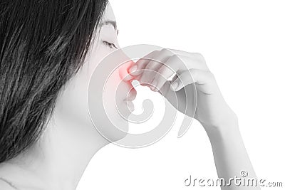 Nose pain symptom in a woman isolated on white background. Clipping path on white background. Stock Photo