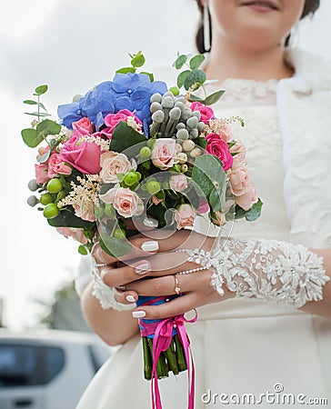Nosegay in hands of bride Stock Photo