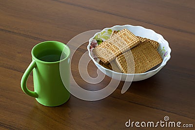 Nosh Light. Water and cookies. Stock Photo