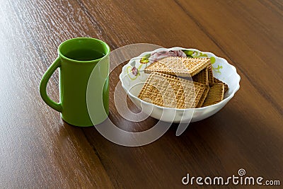 Nosh Light. Water and cookies. Stock Photo