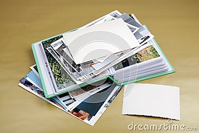 Nostalgia by youth concept - old family photo albums and photos heap Stock Photo
