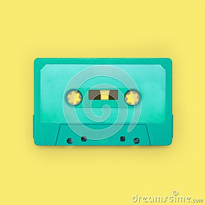 Nostalgic image of a cassette tape, isolated and presented in punchy pastel colors, blank for creative customization Stock Photo
