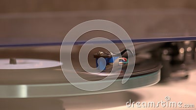 Nostalgic music is playing by the vinyl player. Stock Photo