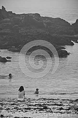 Nostalgic picture of a woman swimming in the Atlantic Ocean Editorial Stock Photo
