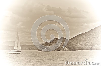 Sailing Past Wild Cat Island, Coniston Water Stock Photo