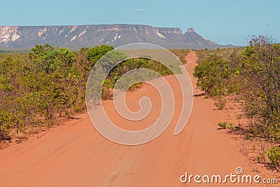 A dirt road in the Cerrado (brazilian tropical savanna) at the Jalapao State Park. State of Tocantins, Brazil. Stock Photo