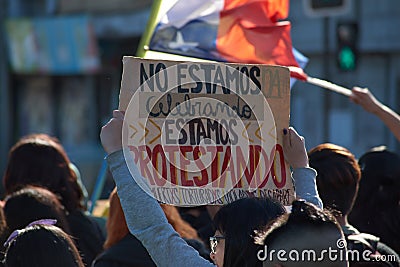 `No More AFP`. Chilean people in a massive protest at Puerto Montt. Protesters with chilean flag Editorial Stock Photo
