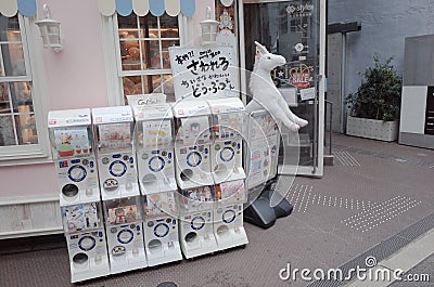 Capsule machines on the streets of Osaka Editorial Stock Photo