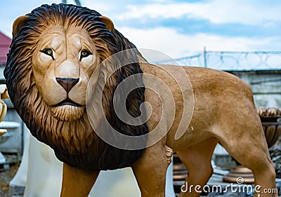 Not a real lion made of plaster Stock Photo