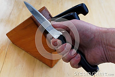 Not the sharpest knife in the block Stock Photo