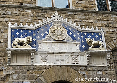 Notable marble frontispiece above the entrance door to the Palazzo Vechio Editorial Stock Photo