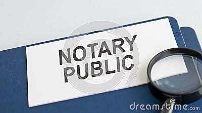 Notary public word on paper and magnifying lens Stock Photo