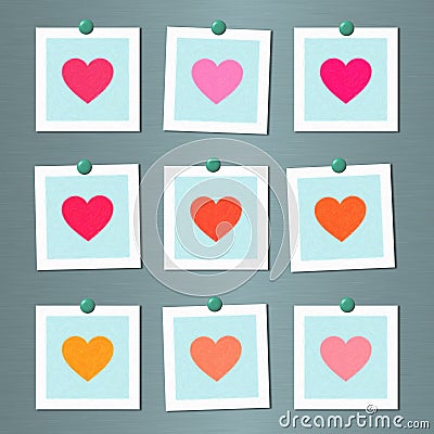 Note cards with painted hearts on wall Stock Photo