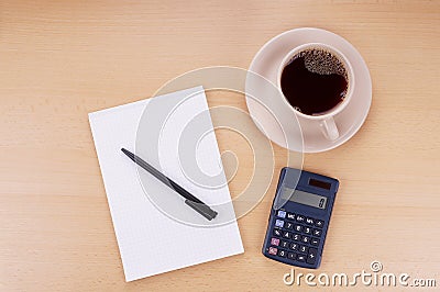 Note pad calculator and coffee Stock Photo