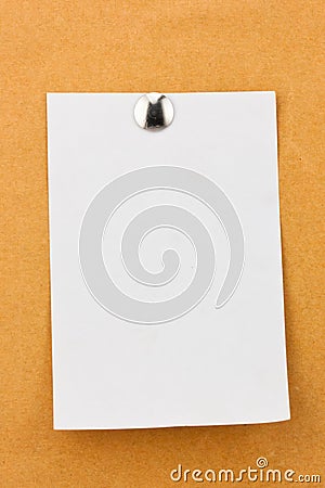 Note paper with metal push pins Stock Photo