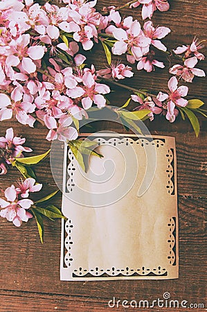 Note, postcard, writing retro peach blossoms on a wooden vintage Stock Photo