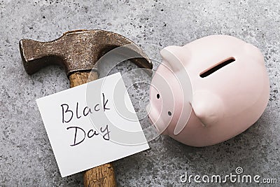 Note with text, piggy bank and hammer on the table. Concept on the topic of last money in a crisis time Stock Photo