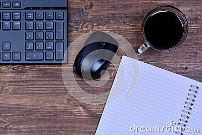 Notebook with coffee mouse and keyboard computer Stock Photo