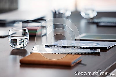 Notebook with documents, desk in office interior and zoom on business table with strategy report. Survey paperwork for Stock Photo