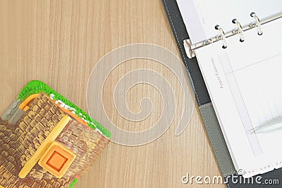 notebook & house model on wooden desk. realtor real estate agent Stock Photo