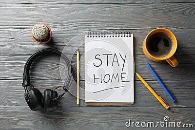 Notebook with Inscription Stay home on background. Quarantine Stock Photo