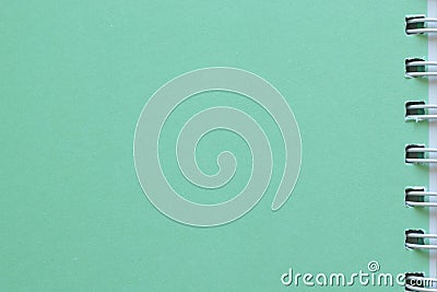 Notebook isolated on green background with copy space for text or image. Stock Photo