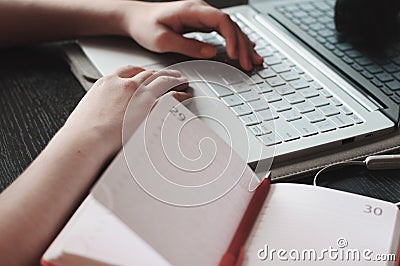 Notebook and laptop using by woman Stock Photo