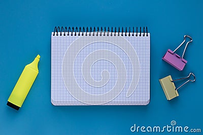 Notebook and pen on blue background. Planning concept. Education concept, copy space. Business office concept. Empty workplace. Stock Photo