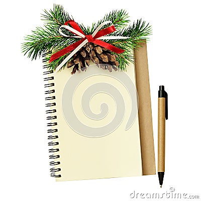 Notebook and pen with Christmas decorations Stock Photo