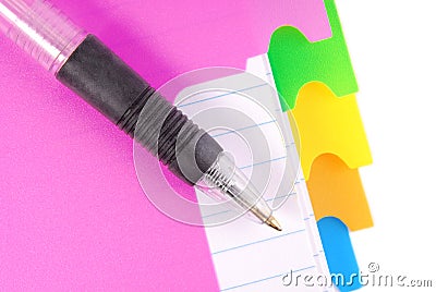 Notebook with pen and color tabs Stock Photo
