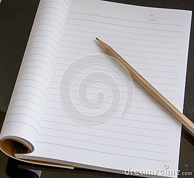 Notebook and pencil Stock Photo