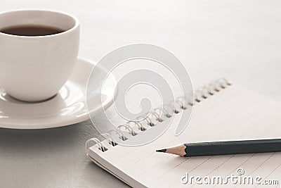 Notebook, pencil and cup of coffee. Stock Photo